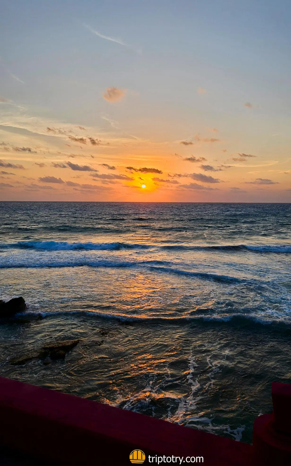 Sun rising over the sea at dawn in Isla Mujeres in Yucatan, Mexico